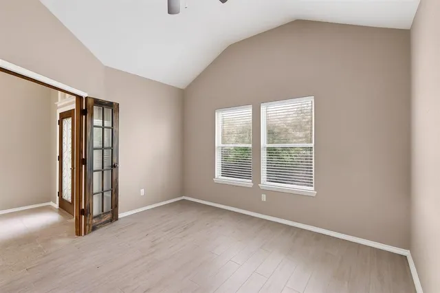 an empty room with windows