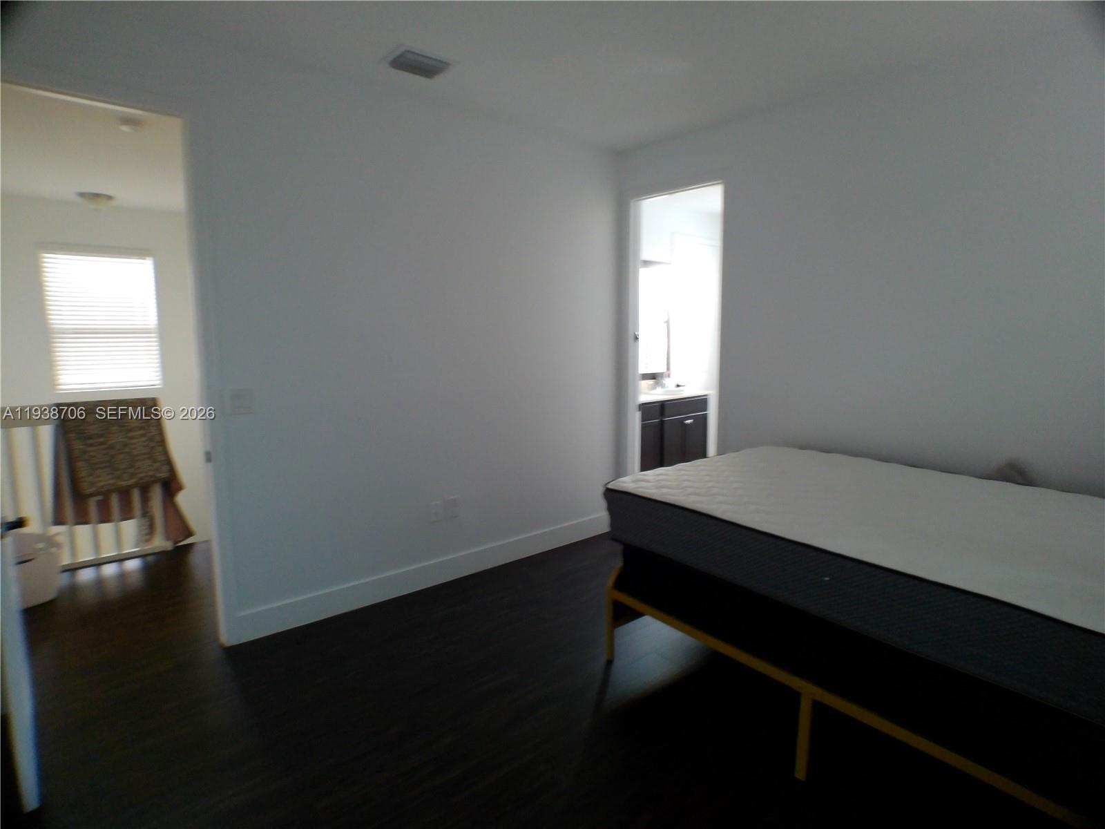 3308 West 95th Terrace Hialeah, FL 33018 - Photo 24 of 29 a room with a window