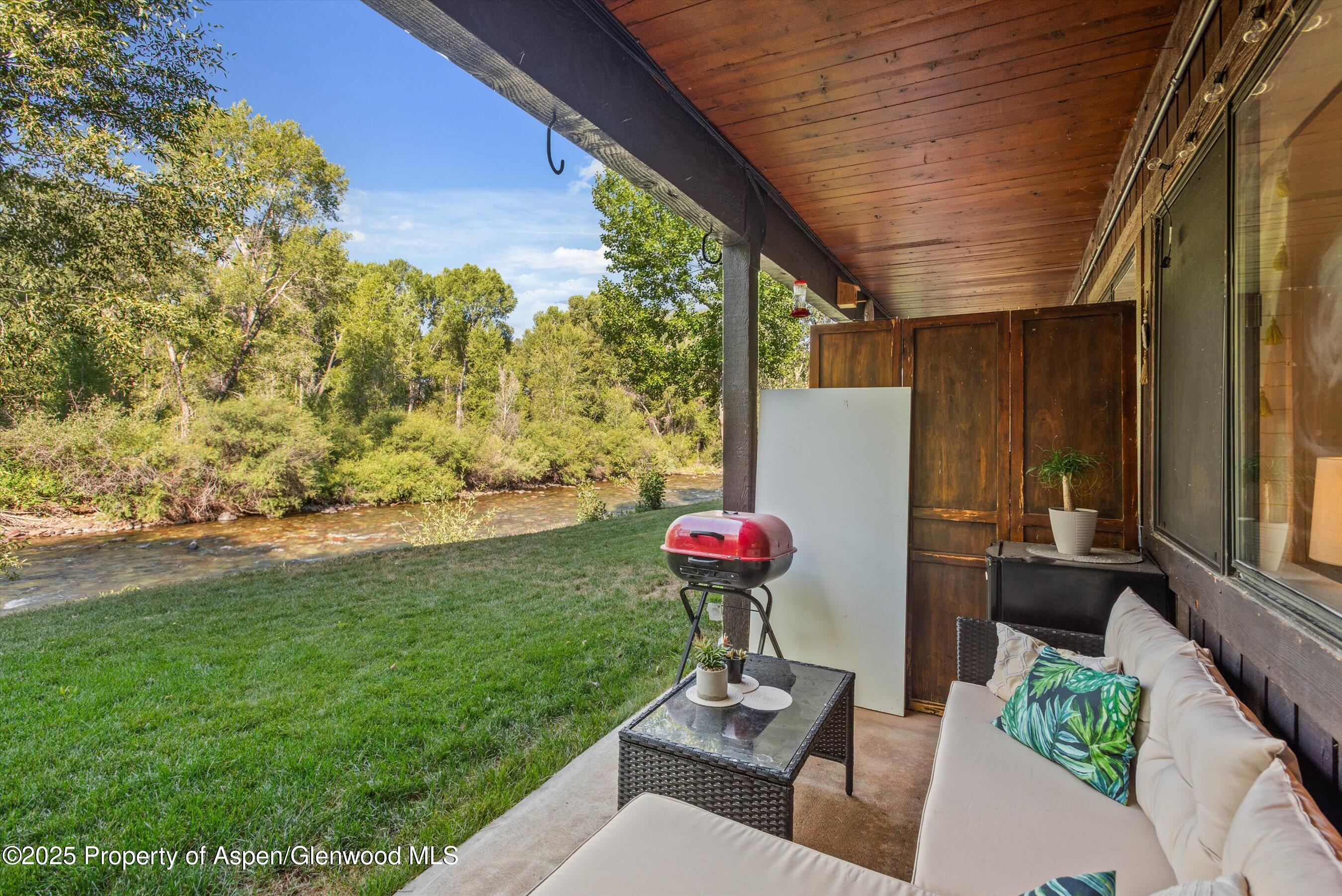 a front view of house with outdoor seating