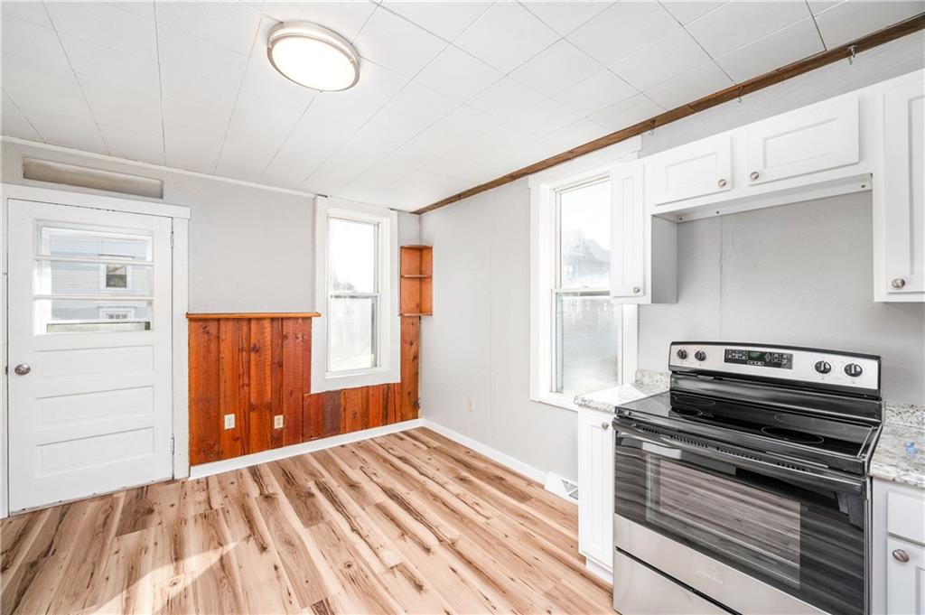 401 West New Castle Street Butler, PA 16001 - Photo 15 of 32 a bedroom with a bed and a window