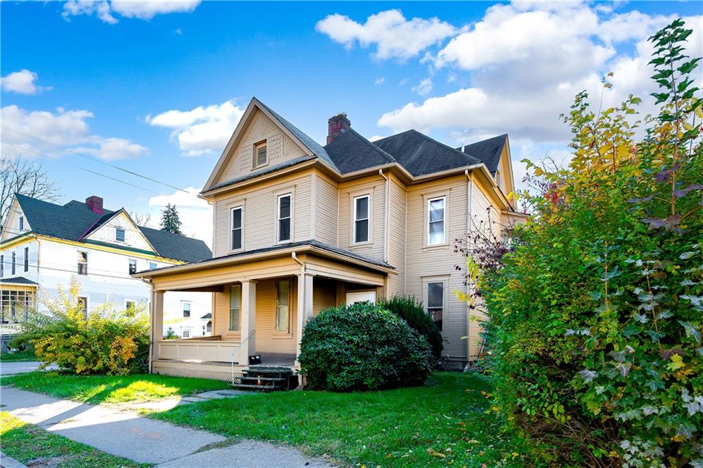 401 West New Castle Street Butler, PA 16001 - Photo 2 of 32 a front view of a house with a yard