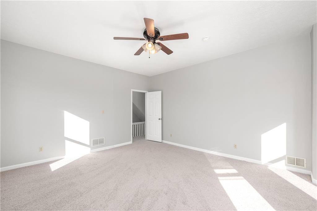 401 West New Castle Street Butler, PA 16001 - Photo 25 of 32 a view of a livingroom with a ceiling fan and window
