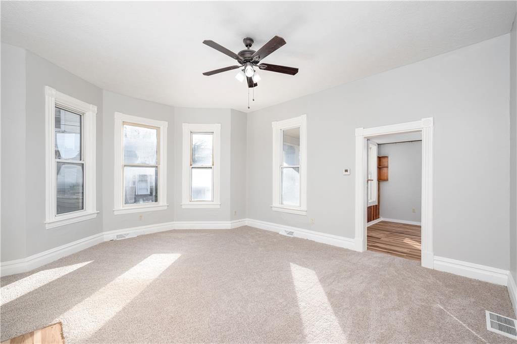 401 West New Castle Street Butler, PA 16001 - Photo 6 of 32 a view of livingroom with a ceiling fan and window