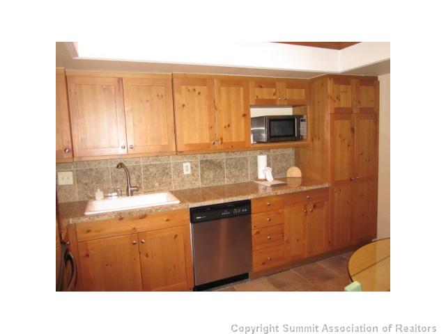 108 Guller Road, Unit A5 Frisco, CO 80443 - Photo 7 of 25 Kitchen. The kitchen has been fully remodeled and has new stainless appliances!