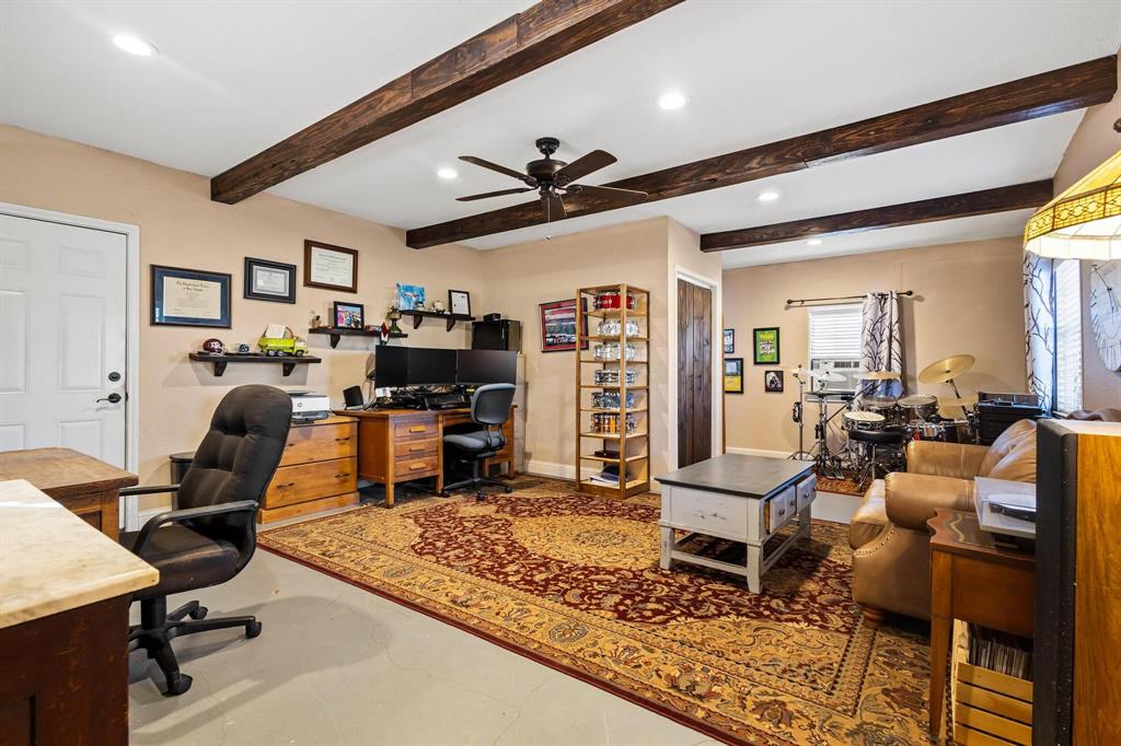 2321 County Road 2100 Ivanhoe, TX 75447 - Photo 32 of 40 a living room with furniture and wooden floor
