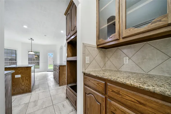 a bathroom with a double vanity sink a mirror and a shower