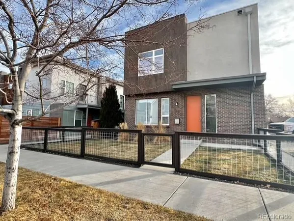 a view of a building with sitting area