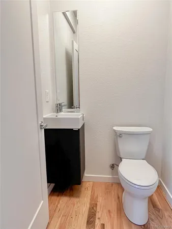 a bathroom with a toilet and a sink