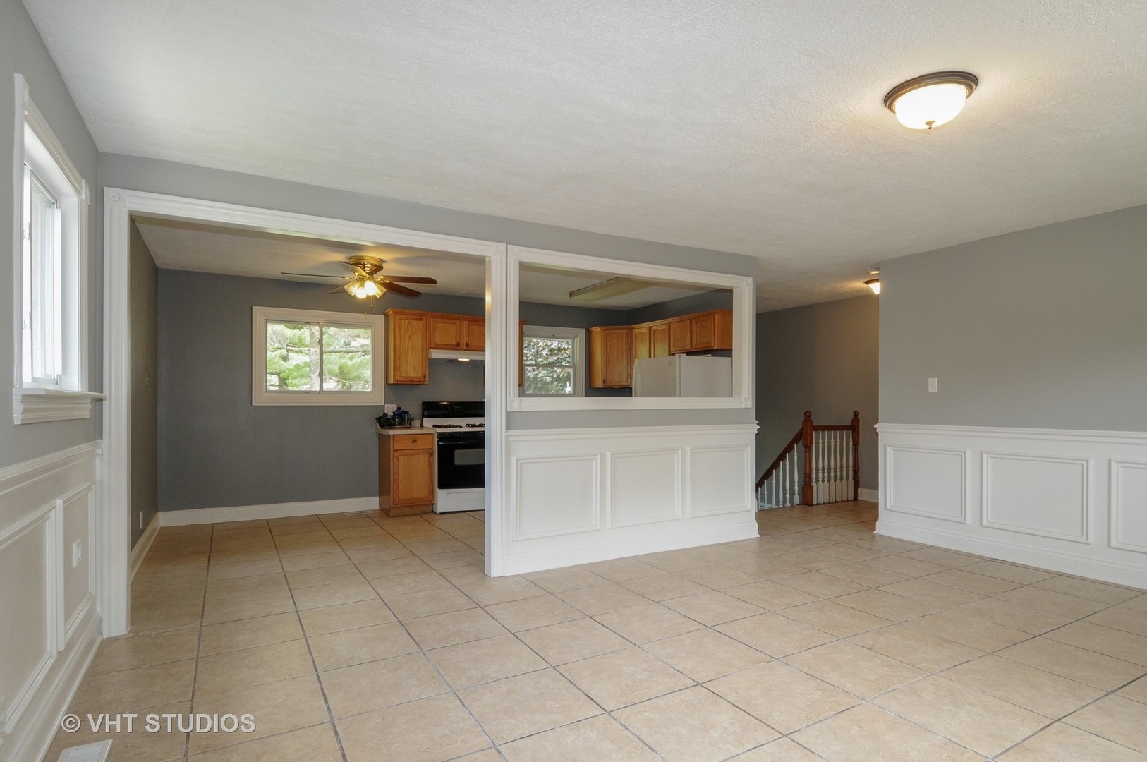 141 Oxford Road Bolingbrook, IL 60440 - Photo 4 of 12 an entryway space and a livingroom with a chandelier