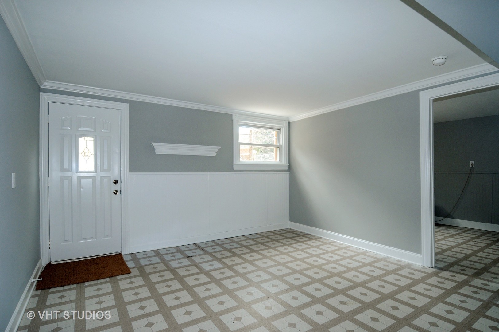 141 Oxford Road Bolingbrook, IL 60440 - Photo 5 of 12 a view of an empty room and window