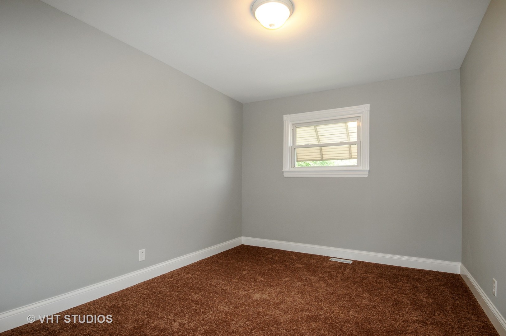 141 Oxford Road Bolingbrook, IL 60440 - Photo 7 of 12 an empty room with a window