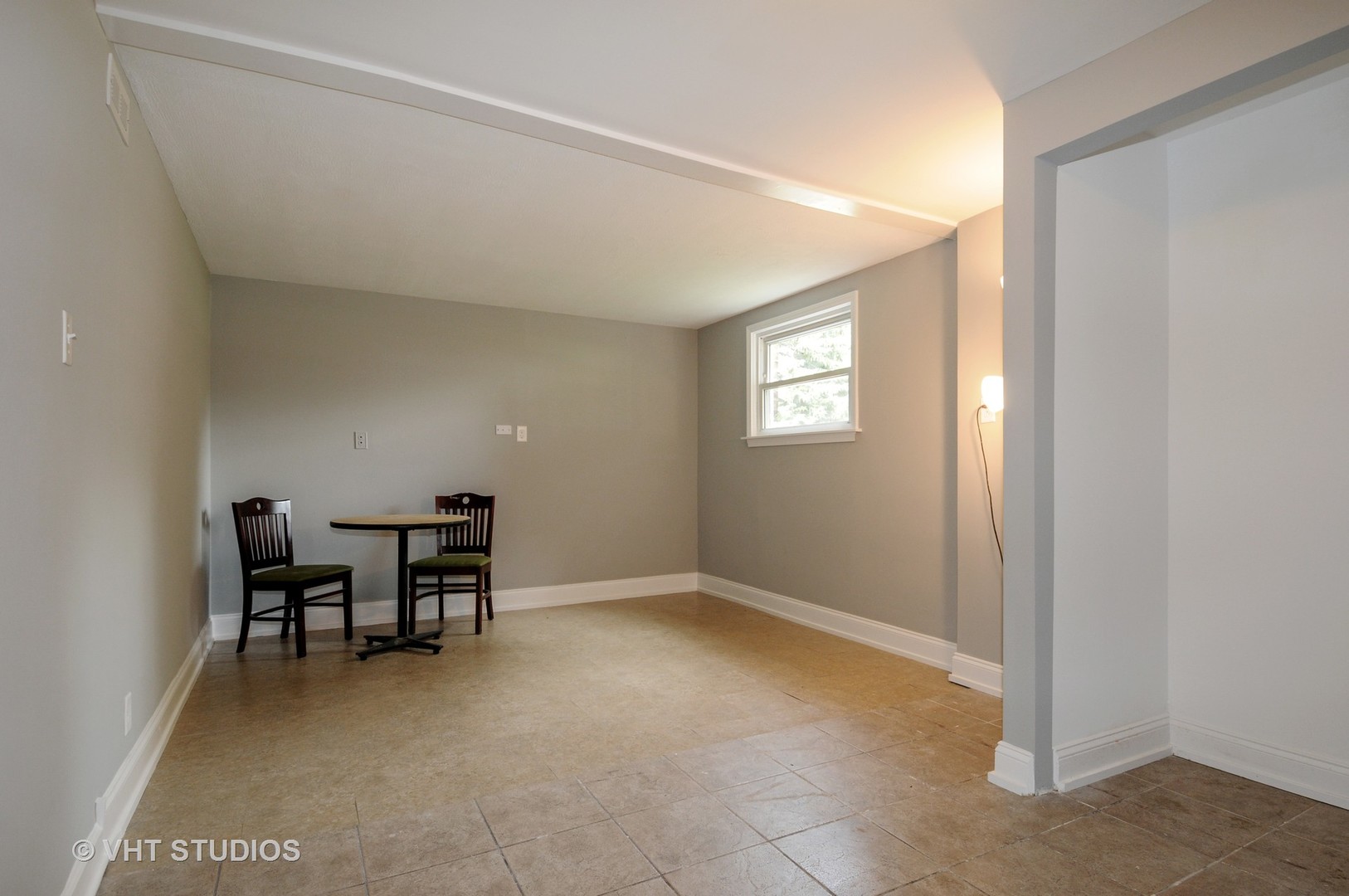 141 Oxford Road Bolingbrook, IL 60440 - Photo 9 of 12 a view of a livingroom with furniture and window