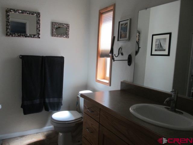21578 Highway 65 Cedaredge, CO 81413 - Photo 24 of 35 a bathroom with a sink and a toilet