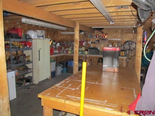 21578 Highway 65 Cedaredge, CO 81413 - Photo 30 of 35 a view of a swimming pool with a patio