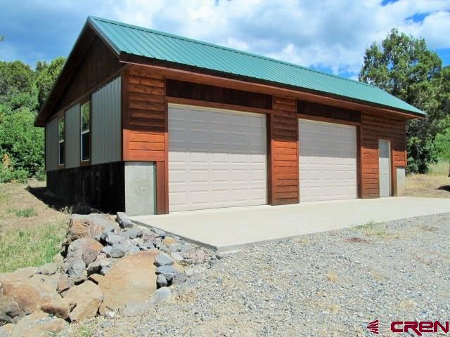 21578 Highway 65 Cedaredge, CO 81413 - Photo 5 of 35 a front view of house