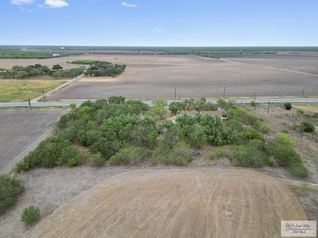 a view of a lake with beach and ocean view