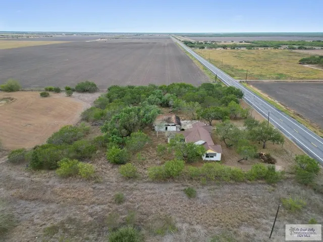a view of a lake with beach and ocean view