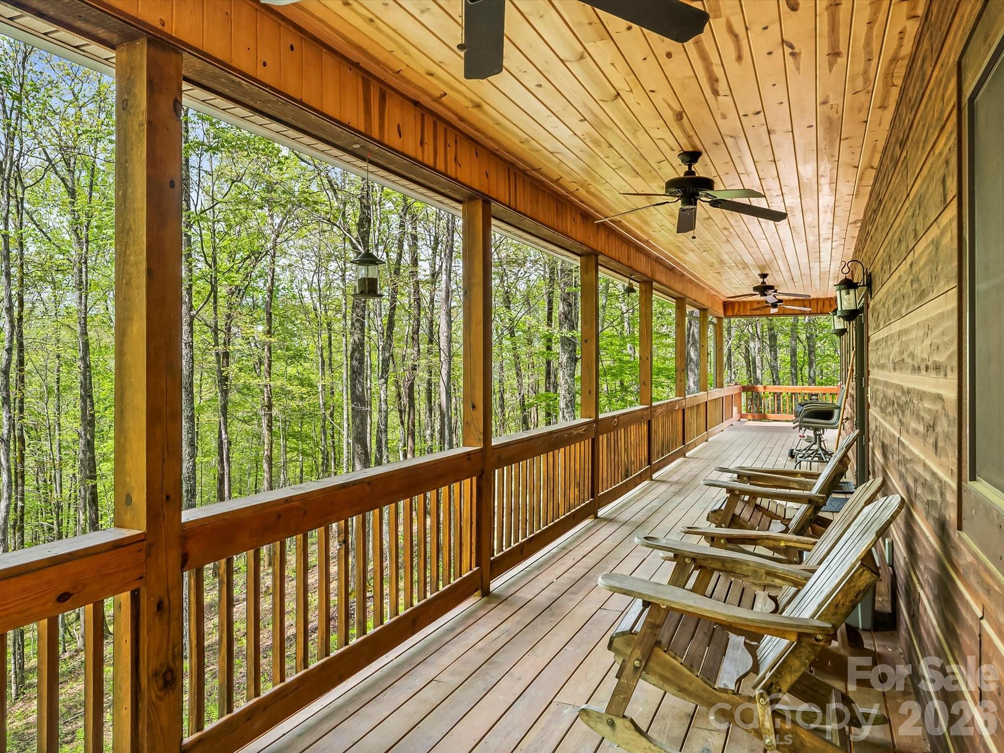 917 Otter Mountain Road Topton, NC 28781 - Photo 42 of 48 a view of a balcony with furniture and wooden floor