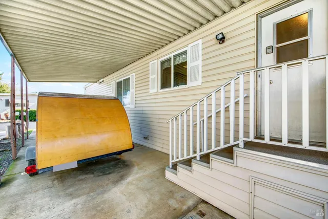 a kitchen with a stove a sink and a refrigerator