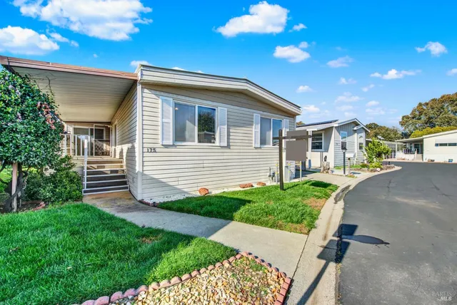 a house view with a garden space