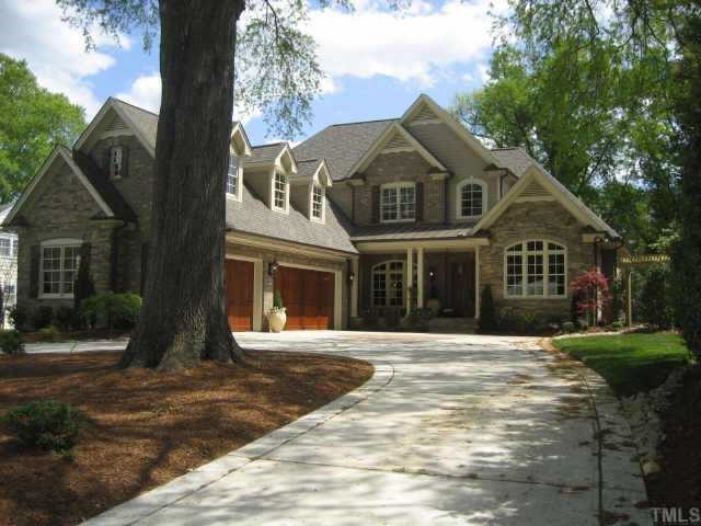 2718 Anderson Drive Raleigh, NC 27608 - Photo 1 of 12 a front view of a house with a yard