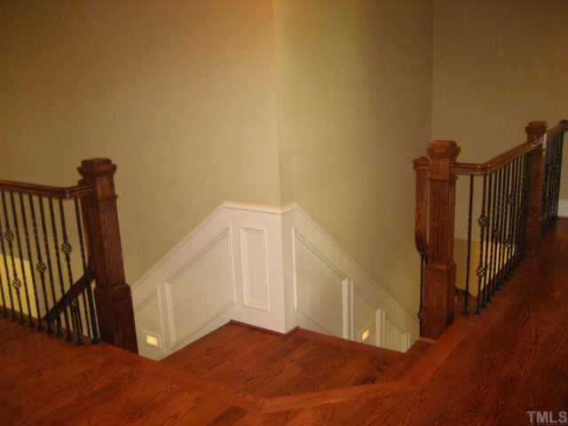 2718 Anderson Drive Raleigh, NC 27608 - Photo 8 of 12 a view of an entryway with staircase