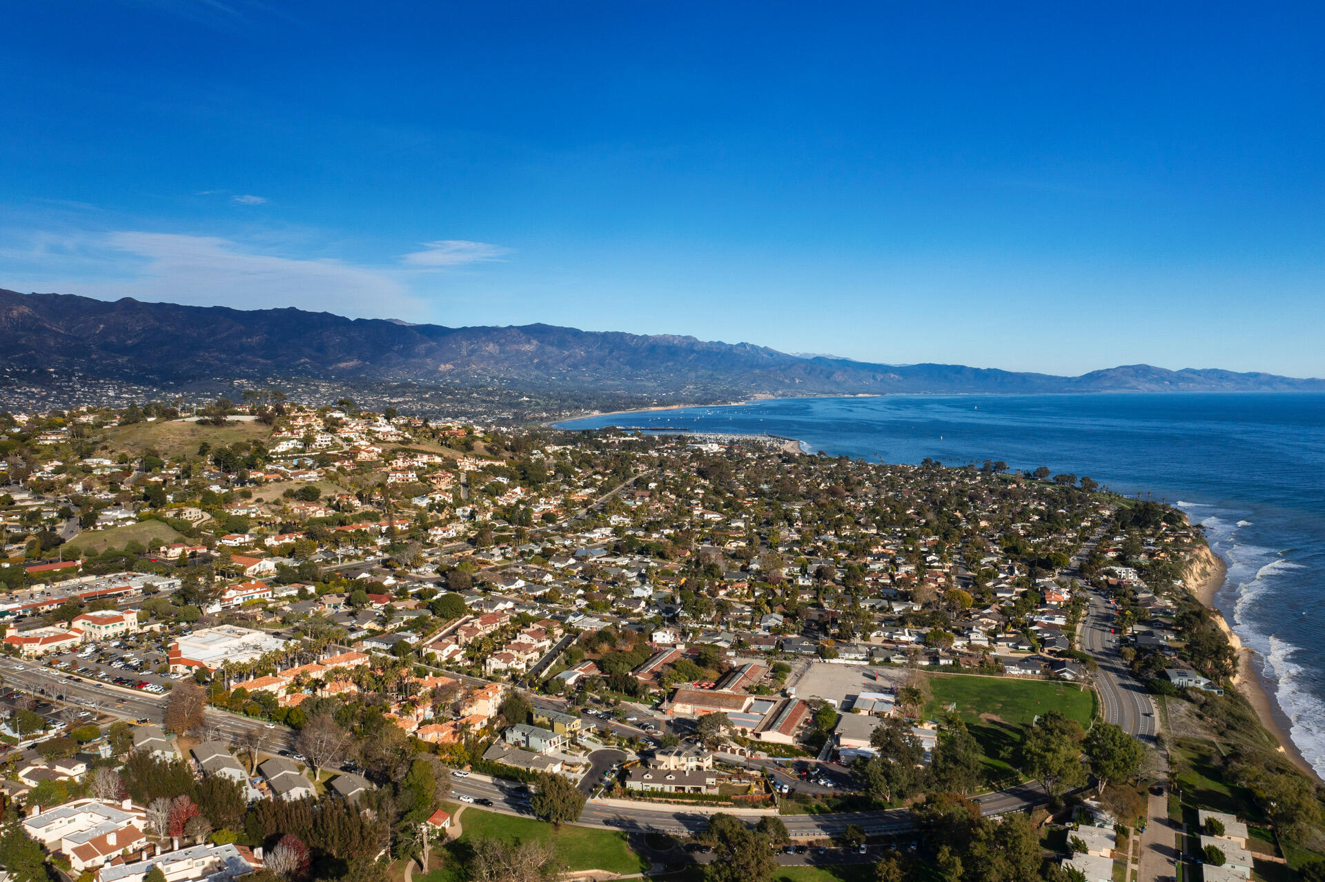 a view of a large mountain with sunset