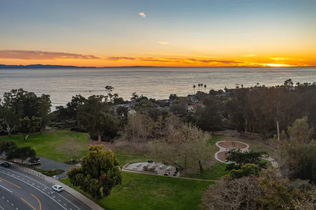 a view of a lake with a mountain in the background