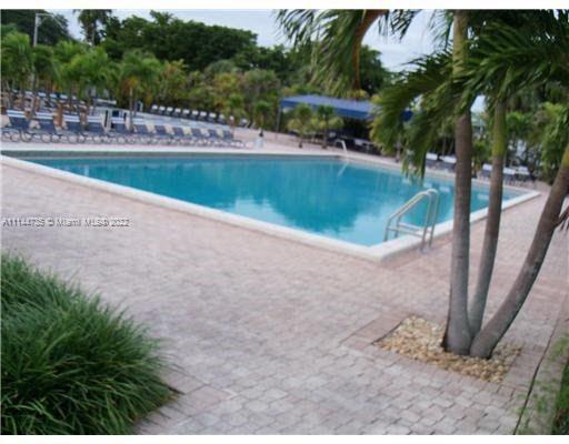 14911 Southwest 104th Street, Unit 1722 Miami, FL 33196 - Photo 2 of 29 a view of outdoor space yard and lake view