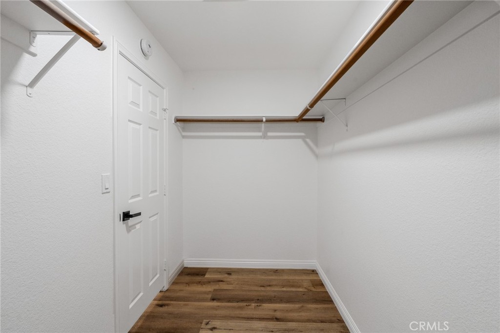 34634 Pso Del Valle Barstow, CA 92311 - Photo 15 of 37 a view of a room with wooden floor and white walls