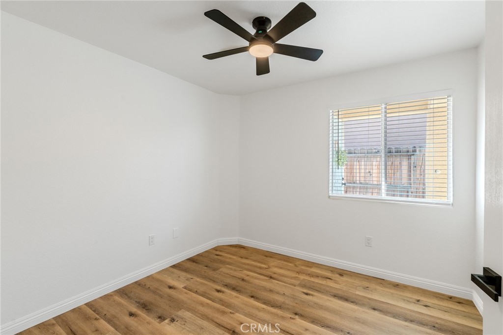 34634 Pso Del Valle Barstow, CA 92311 - Photo 20 of 37 an empty room with a window and a ceiling fan