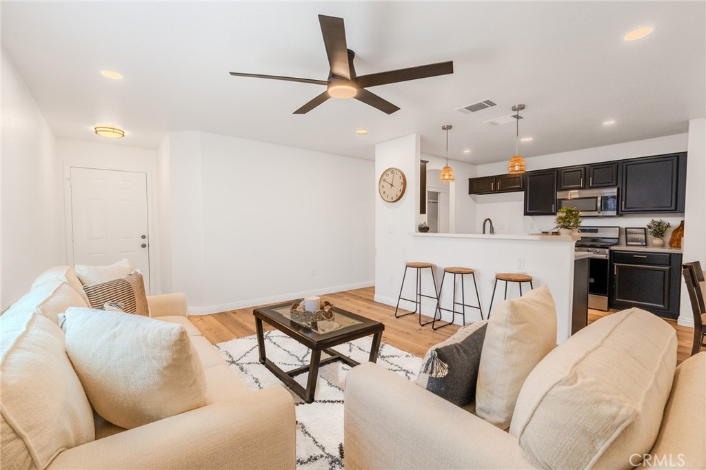 34634 Pso Del Valle Barstow, CA 92311 - Photo 2 of 37 a living room with furniture kitchen view and a window