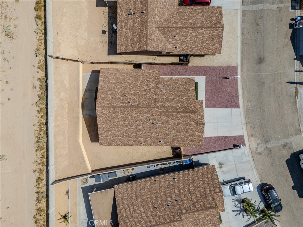 34634 Pso Del Valle Barstow, CA 92311 - Photo 30 of 37 a bathroom with a granite countertop sink a mirror and shower