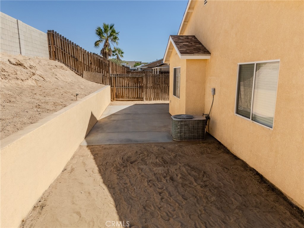 34634 Pso Del Valle Barstow, CA 92311 - Photo 34 of 37 a view of a hallway with wooden floor and staircase