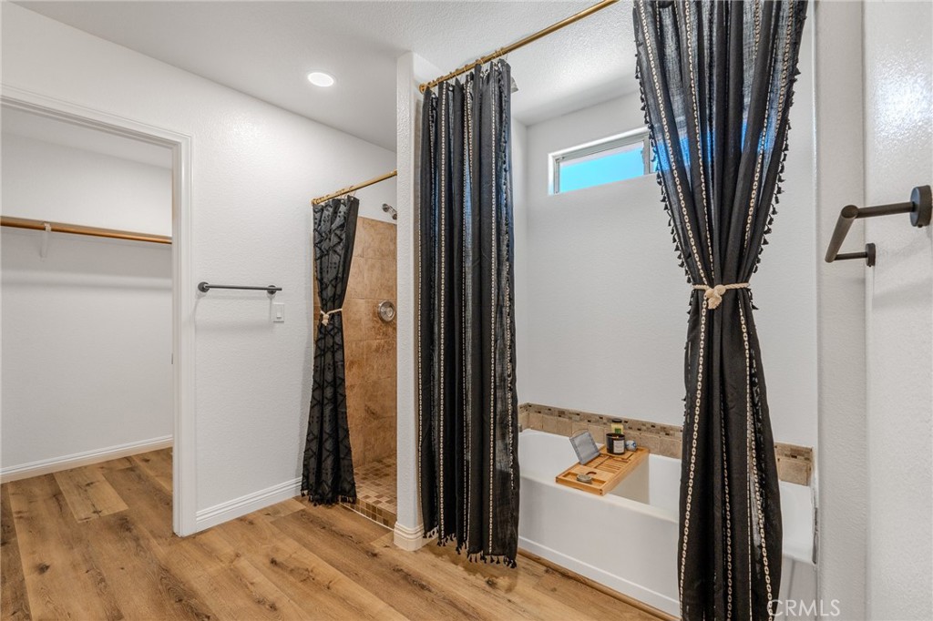 34634 Pso Del Valle Barstow, CA 92311 - Photo 10 of 37 a bathroom with a bathtub and a shower