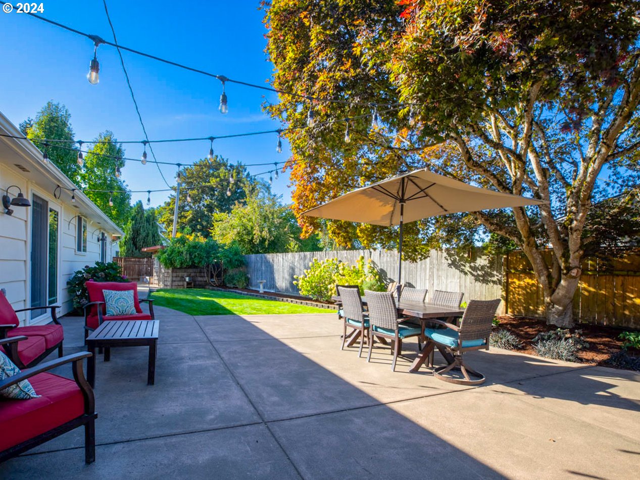 1440 Fetlock Court Eugene, OR 97401 - Photo 19 of 31 a view of a backyard with sitting area and furniture
