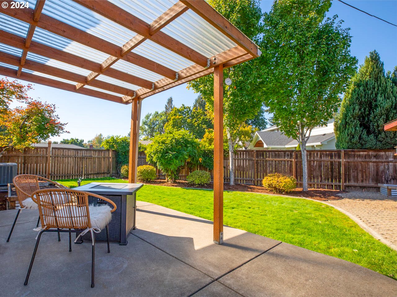 1440 Fetlock Court Eugene, OR 97401 - Photo 23 of 31 a view of a chair and table in backyard of the house