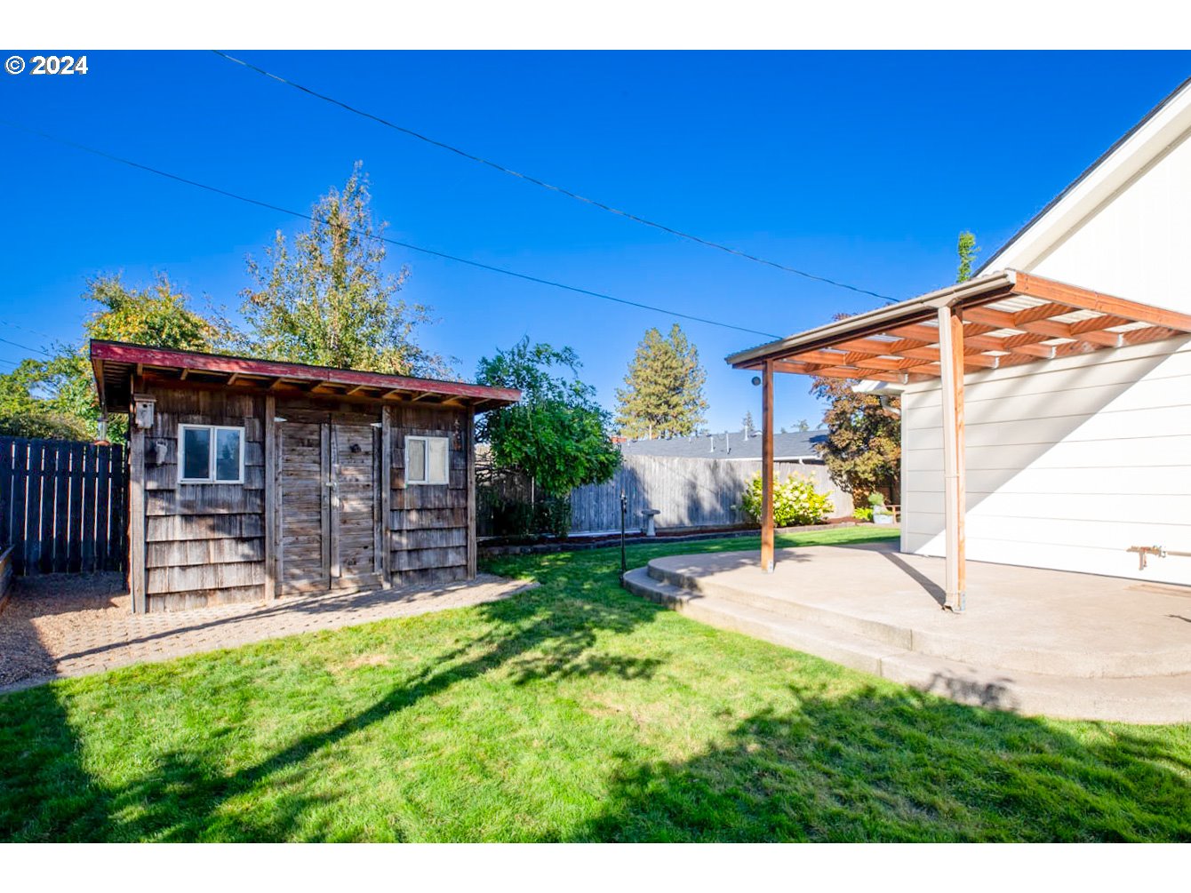 1440 Fetlock Court Eugene, OR 97401 - Photo 24 of 31 a view of a chair and table in backyard