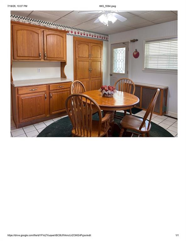 1139-1143 New Stanton Ruffsdale Road, Unit CYNKAR Ruffs Dale, PA 15679 - Photo 4 of 29 a kitchen with granite countertop a sink dishwasher a stove and a dining table with chair
