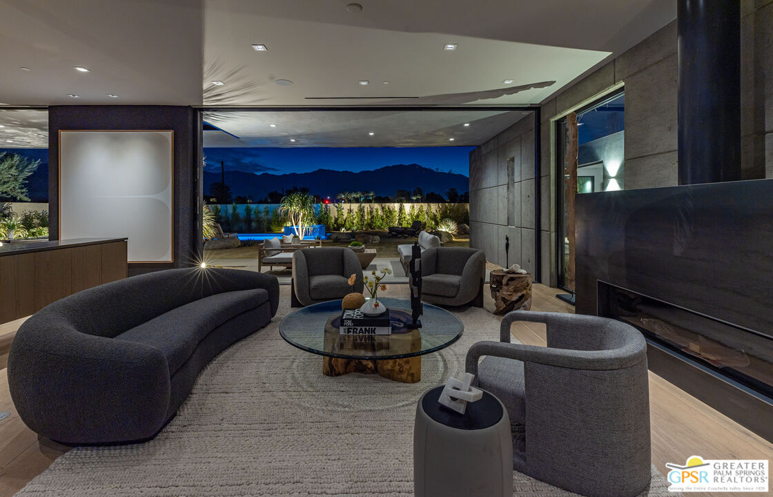 1 Echo Lane Rancho Mirage, CA 92270 - Photo 11 of 51 a living room with furniture and a fireplace