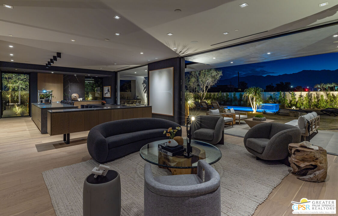 1 Echo Lane Rancho Mirage, CA 92270 - Photo 12 of 51 a living room with furniture and a potted plant