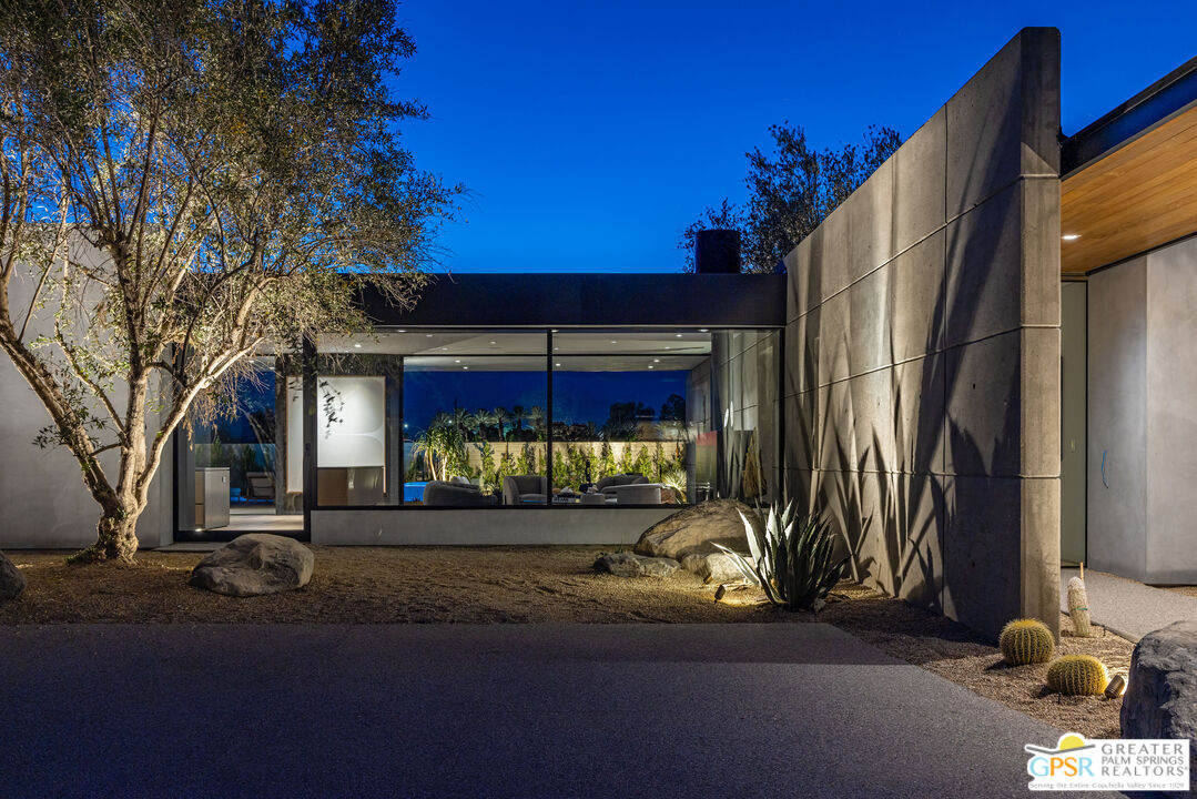 1 Echo Lane Rancho Mirage, CA 92270 - Photo 5 of 51 a front view of a house with yard