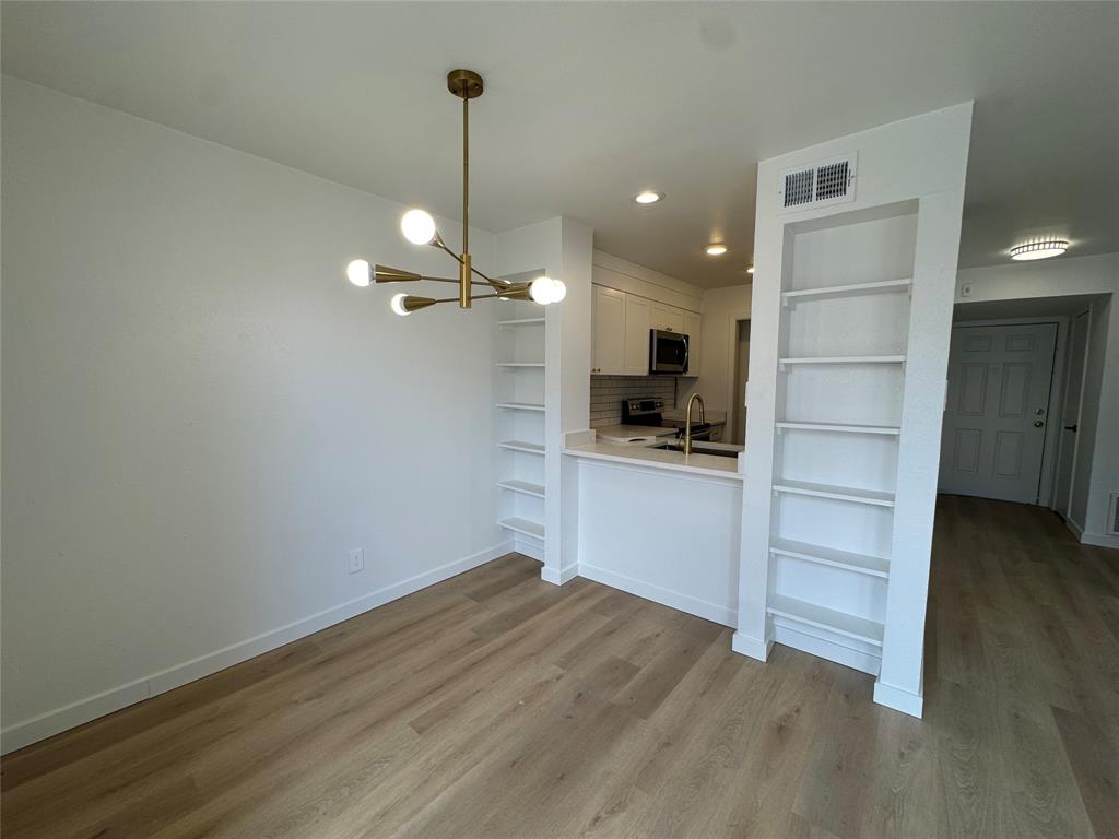 5510 Boca Raton Boulevard, Unit 431 Fort Worth, TX 76112 - Photo 4 of 19 a view of a kitchen with a sink and dishwasher