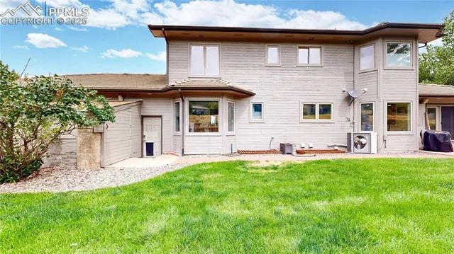 a view of a garden with an outdoor space