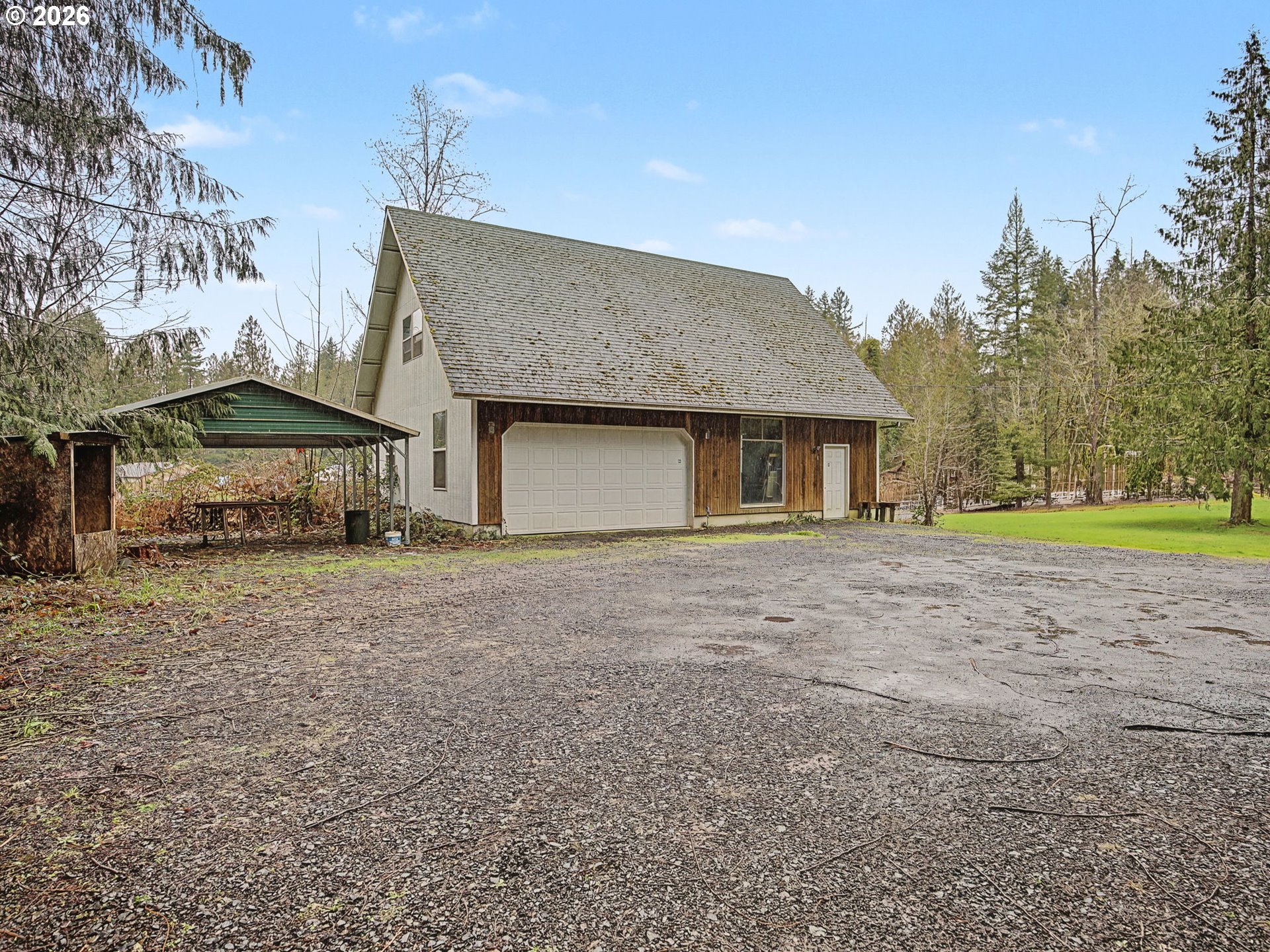 41180 Southeast Kubitz Road Sandy, OR 97055 - Photo 26 of 35 a house view with a garden space