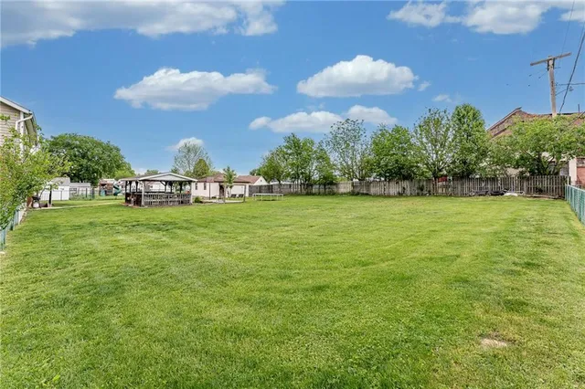 a view of a golf course with a lake