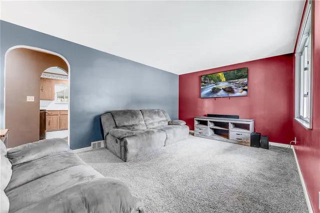 a view of livingroom with furniture and window