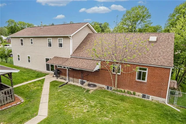 an aerial view of a house with garden
