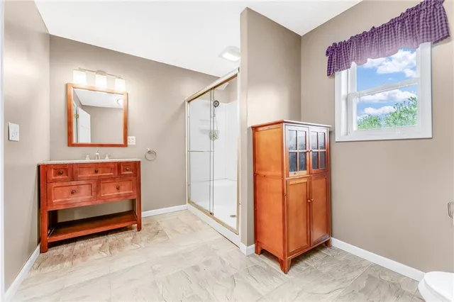 a view of an entryway with front door