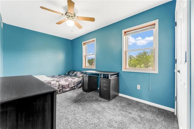 a room with furniture and window